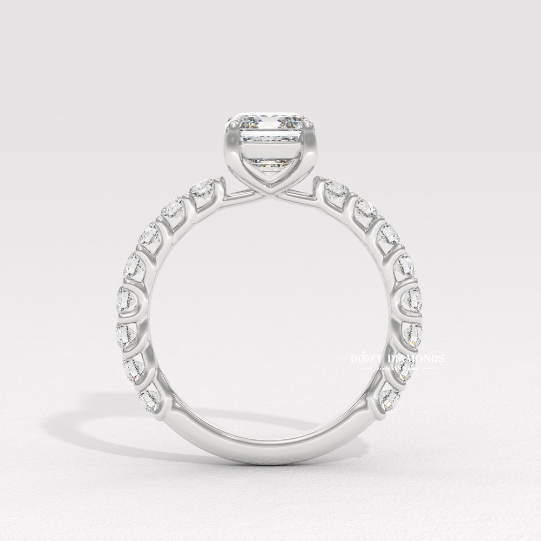 Emerald pave engagement ring shown on hand for true-to-life sizing