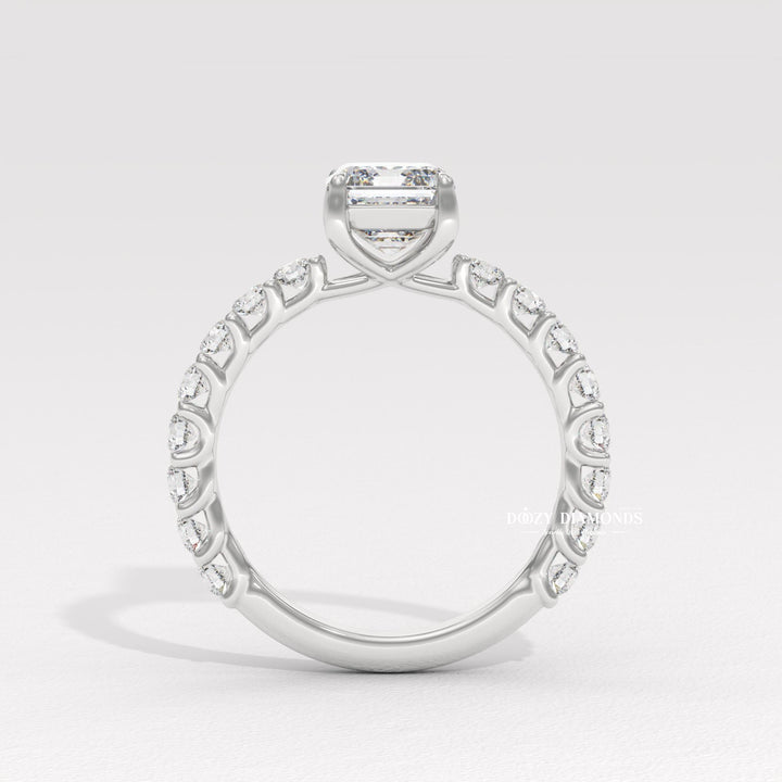 Emerald pave engagement ring shown on hand for true-to-life sizing