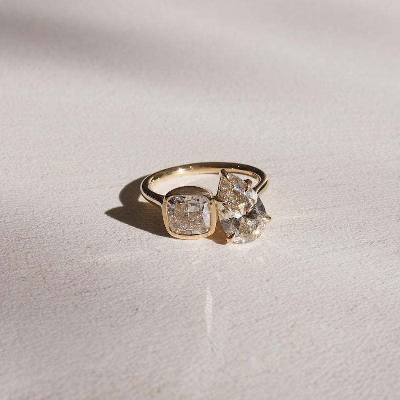 Profile view of pear cut solitaire engagement ring band