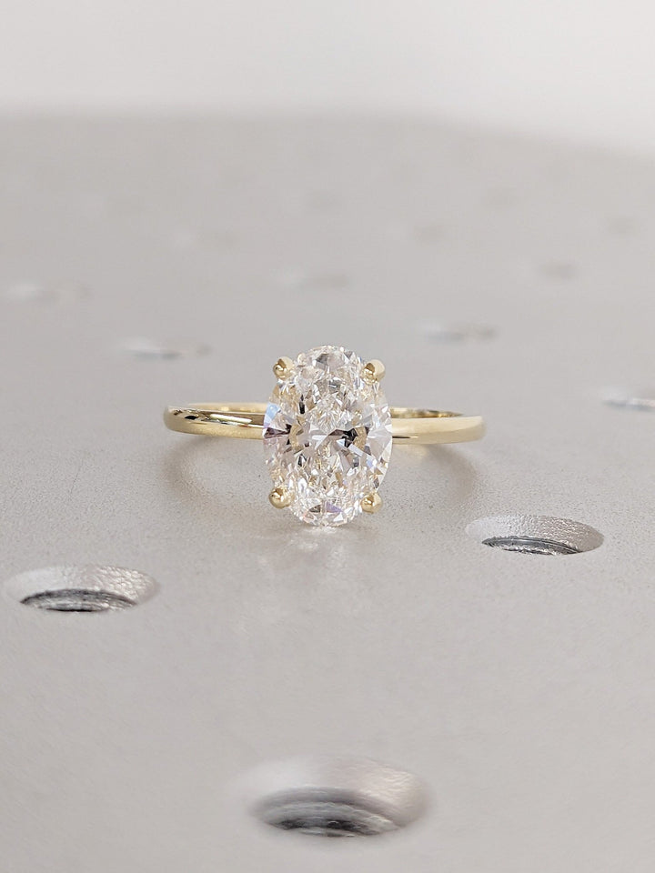 1.50CT oval cut hidden halo engagement ring available to buy now