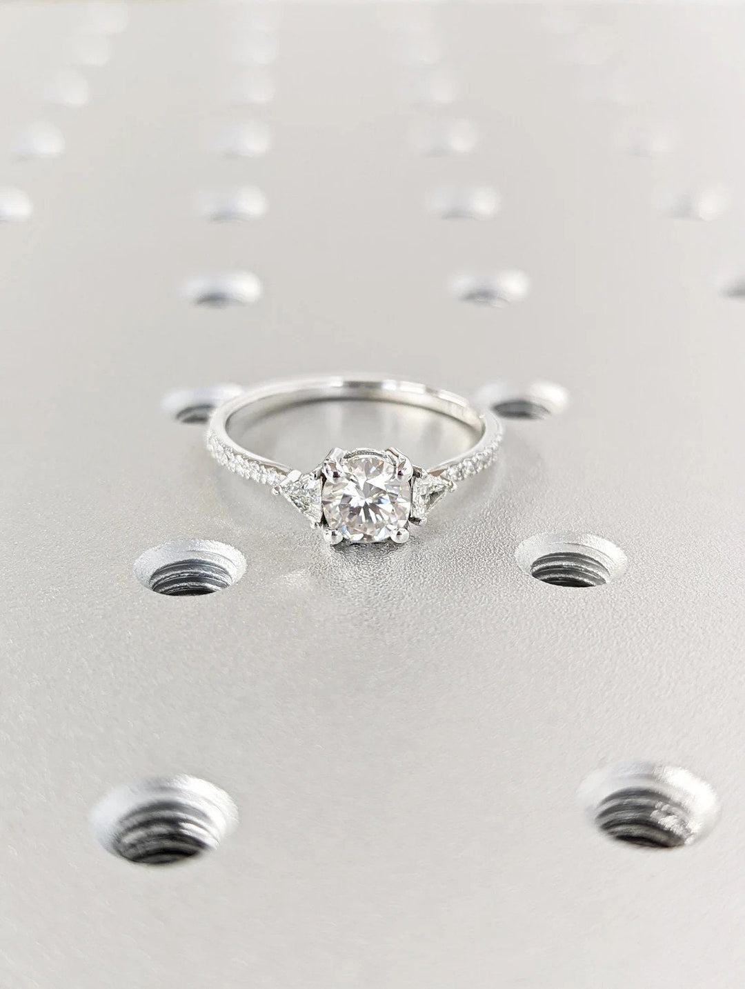 Side angle of round pave diamond engagement ring