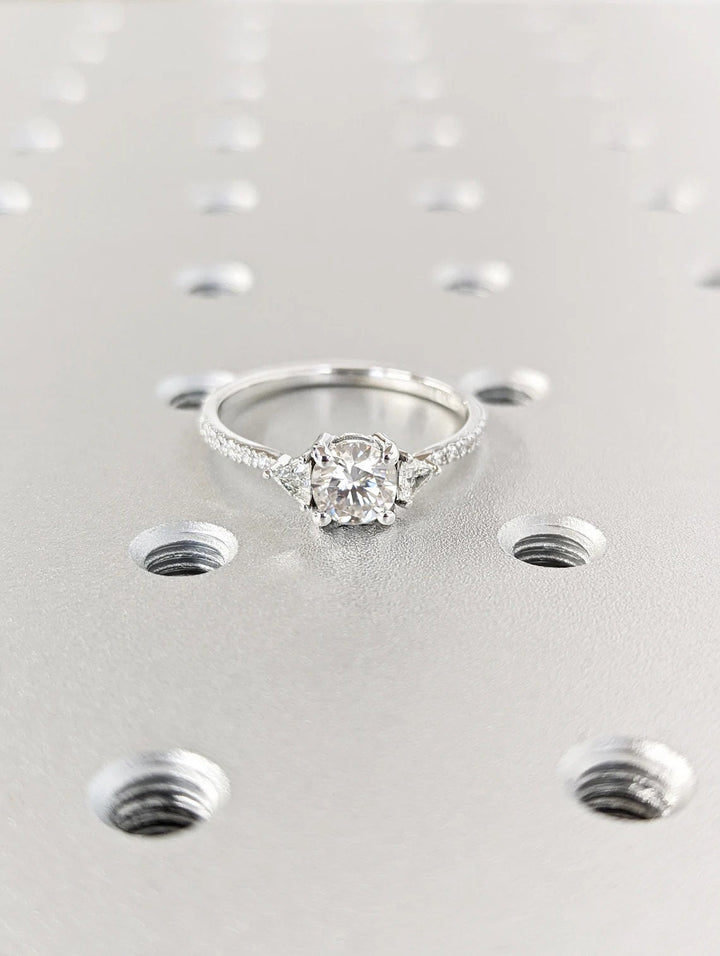 Side angle of round pave diamond engagement ring