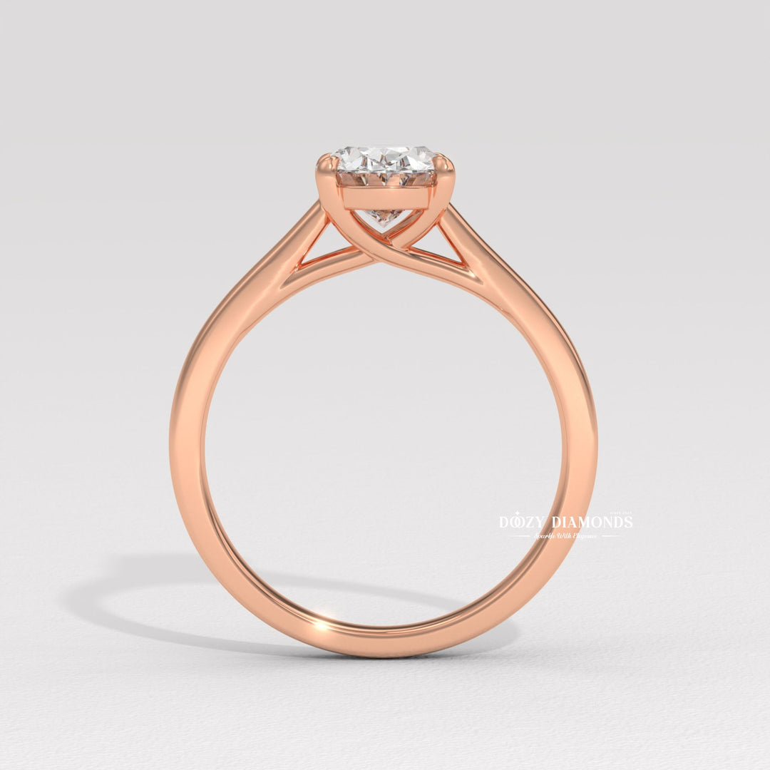 Oval solitaire engagement ring close-up highlighting diamond sparkle