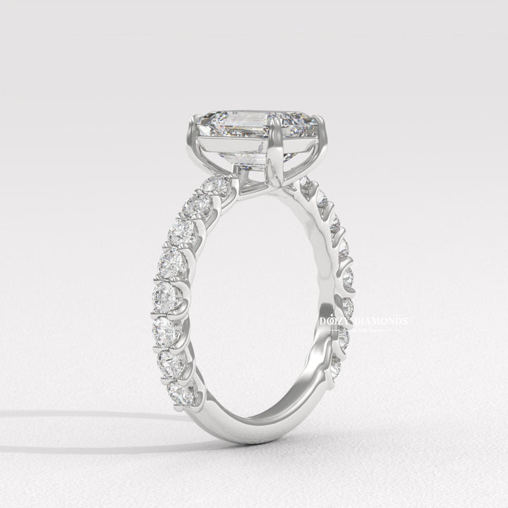 Emerald pave engagement ring viewed from the side