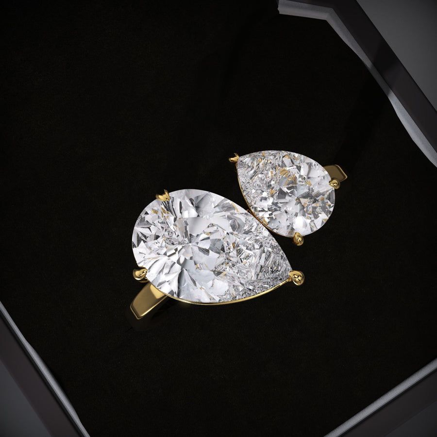 Pear cut solitaire engagement ring available to buy now