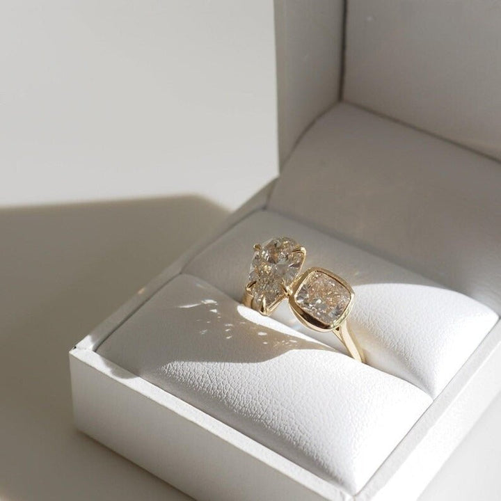 Pear solitaire engagement ring viewed from the side