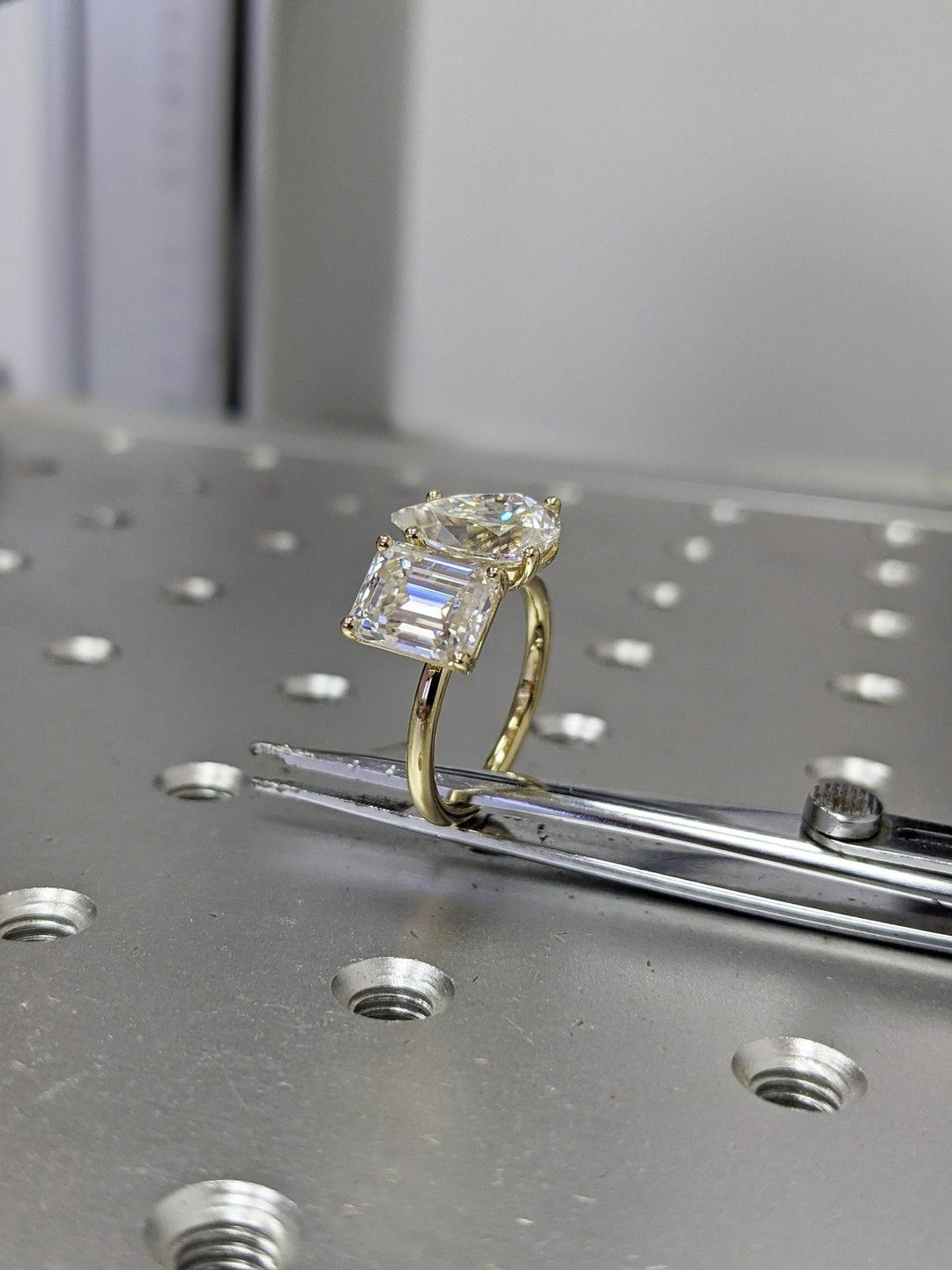 Side angle of pear solitaire diamond engagement ring