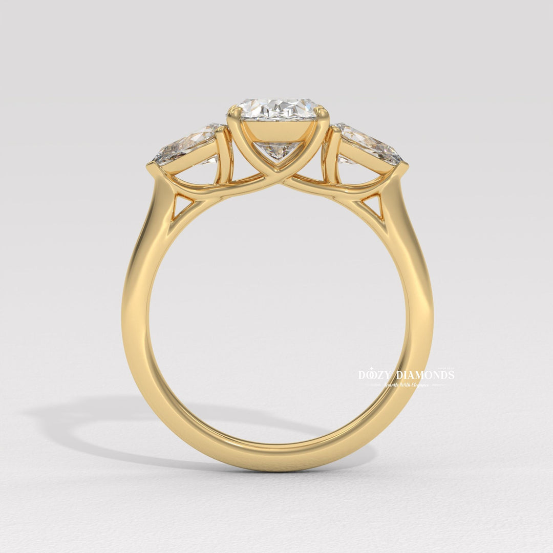 Macro shot of oval cut diamond facets in three stone ring setting
