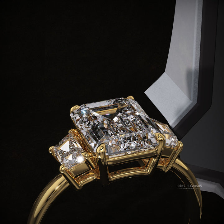 Emerald three stone engagement ring with certified lab grown diamond