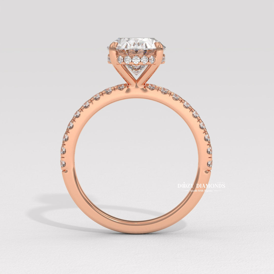 Oval cut diamond ring worn on hand