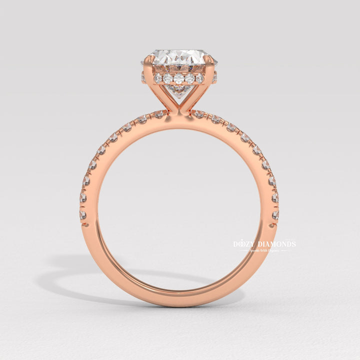 Oval cut diamond ring worn on hand