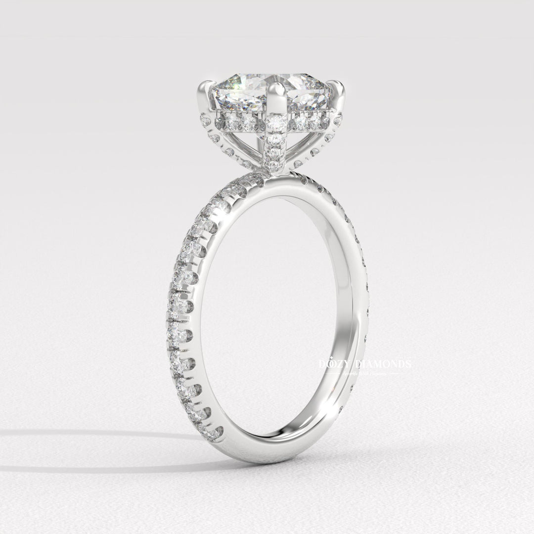 Cushion solitaire diamond ring displayed on jewelry stand