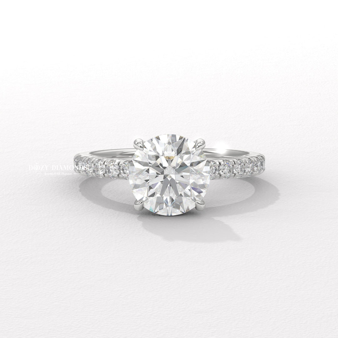 Round pave diamond engagement ring available in multiple metals