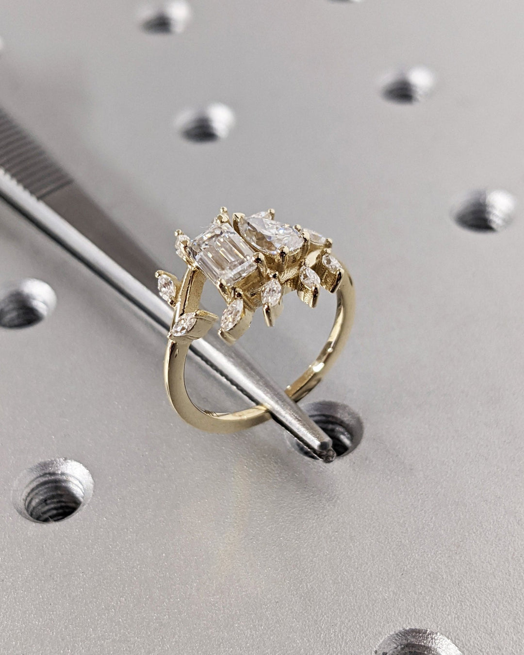 Unboxing view of pear cut solitaire diamond engagement ring