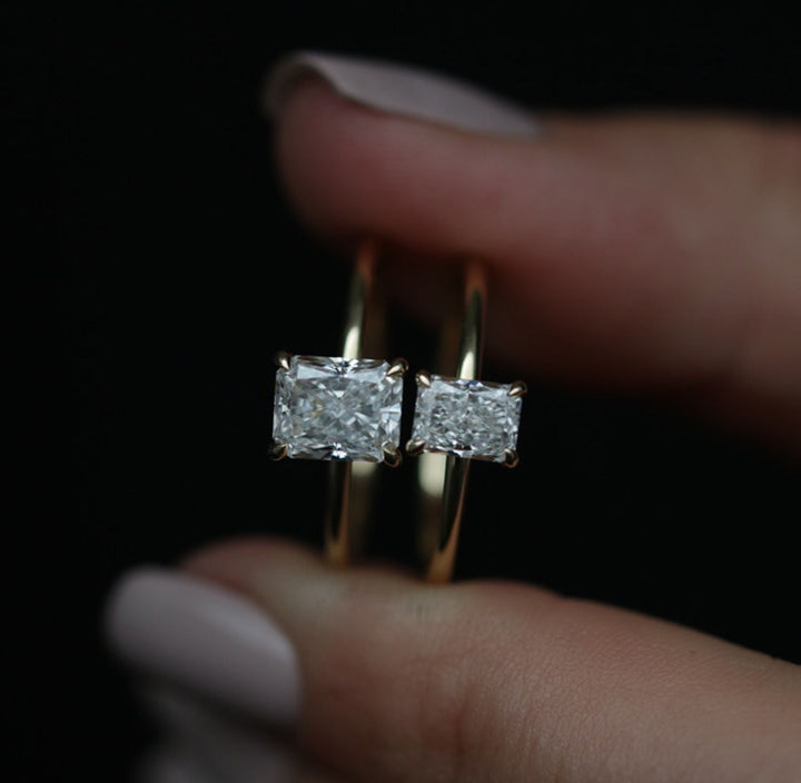 Close-up of radiant cut center diamond in solitaire engagement ring
