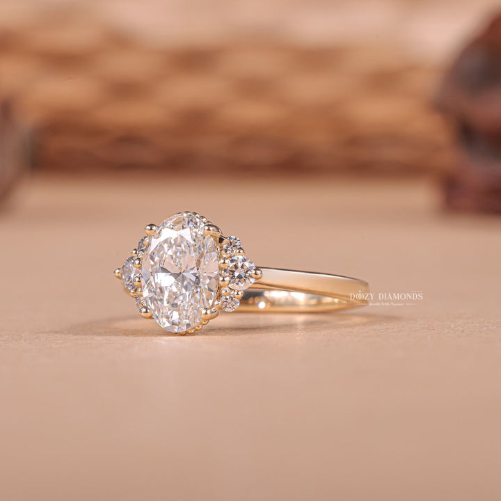 Lifestyle shot of oval cluster diamond ring on hand