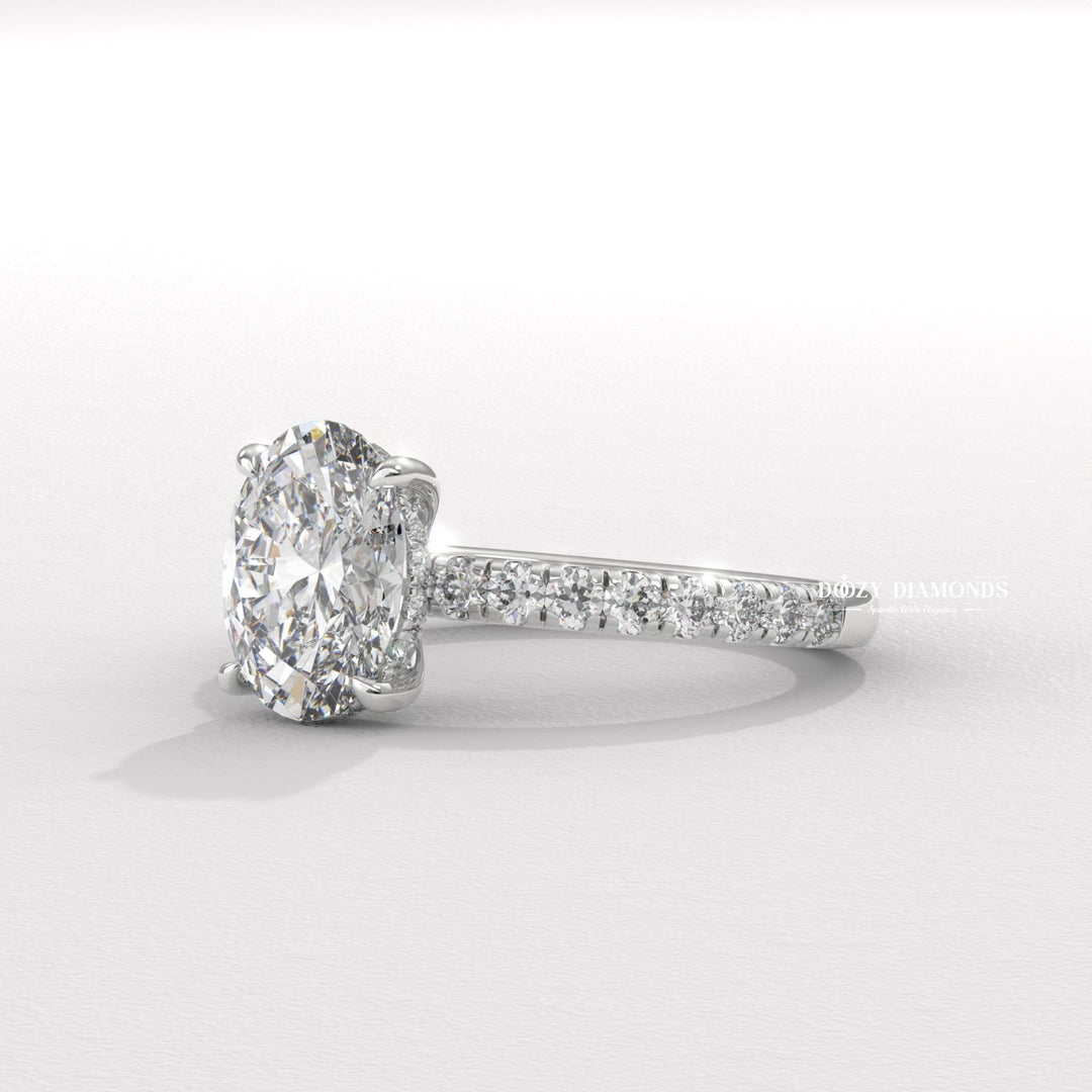 Oval hidden halo lab grown diamond ring side profile in gold setting