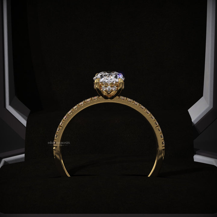 Oval cut engagement ring side view showing band detail