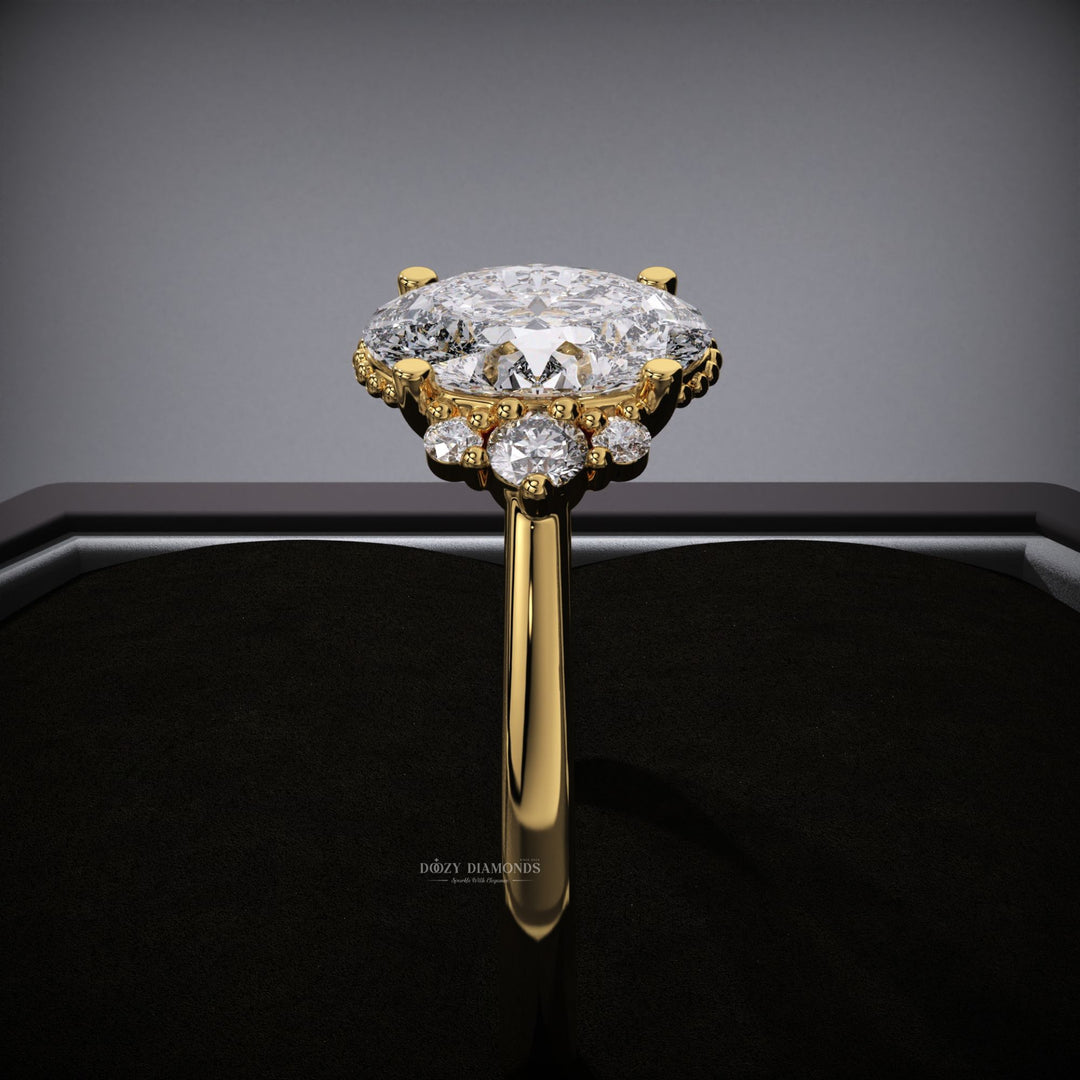 Profile view of oval cut cluster engagement ring band