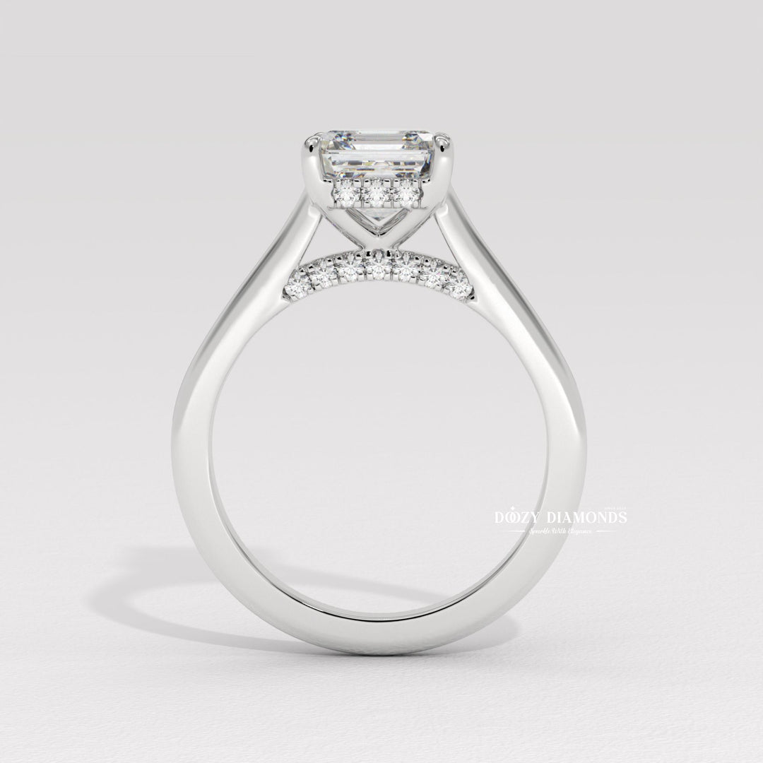 Asscher hidden halo diamond ring displayed on jewelry stand