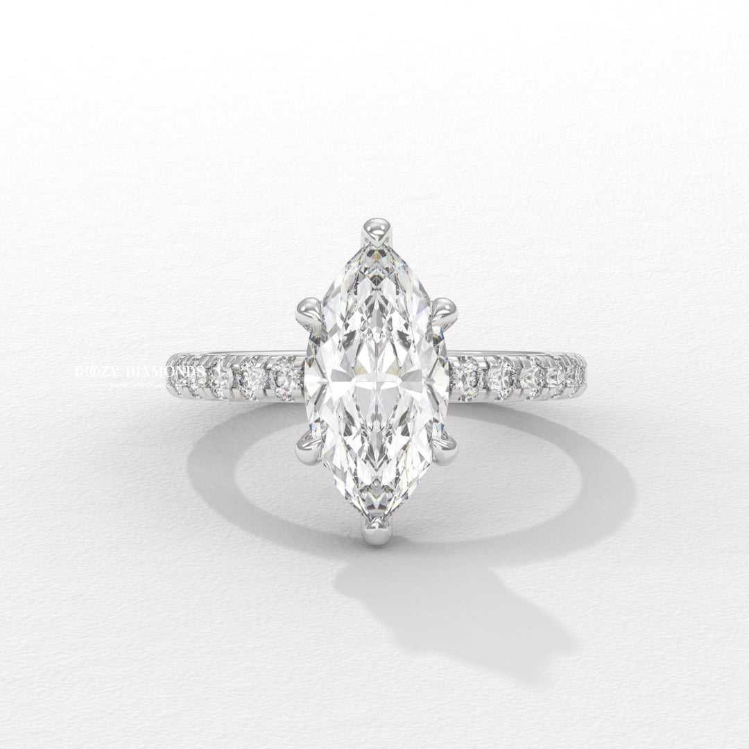 Marquise solitaire lab grown diamond ring side profile in gold setting