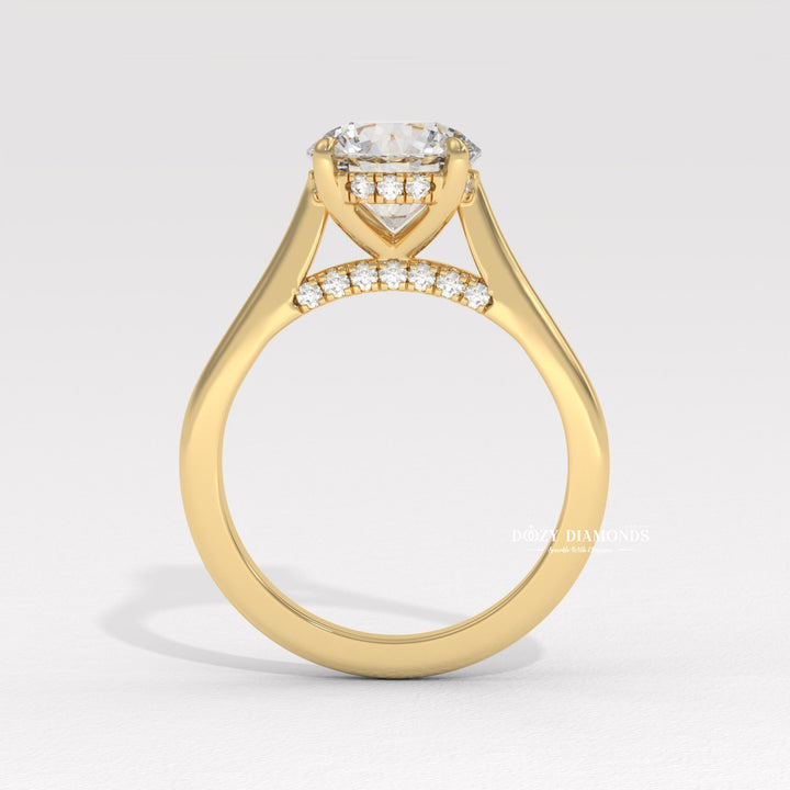 Close-up of round cut center diamond in hidden halo engagement ring