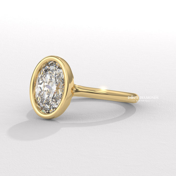 Premium oval cut bezel engagement ring crafted in solid gold