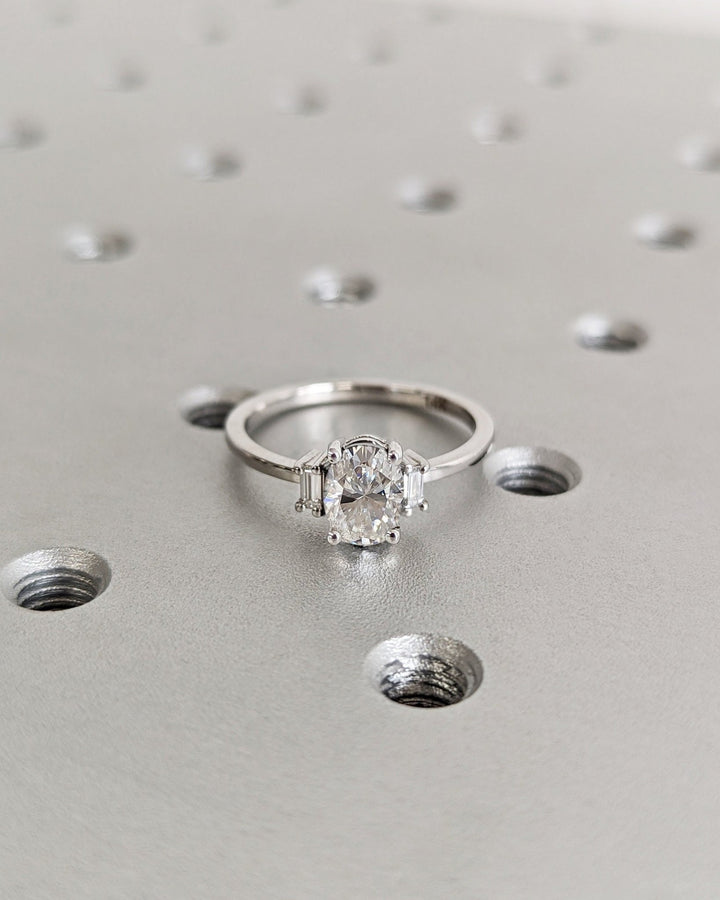 Close-up of oval cut center diamond in solitaire engagement ring