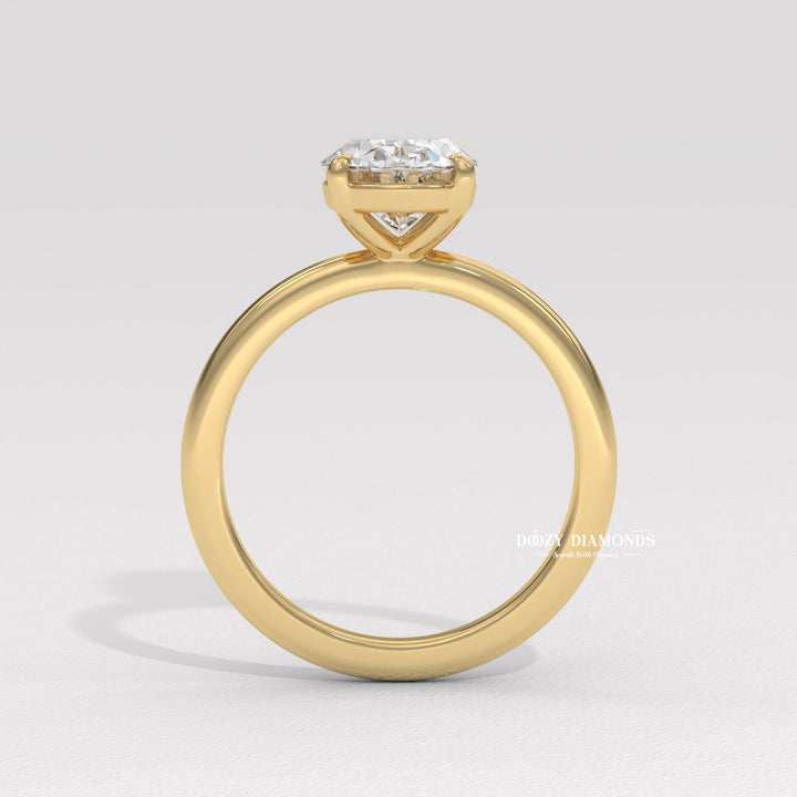 Oval cut solitaire engagement ring shown in real-life wear