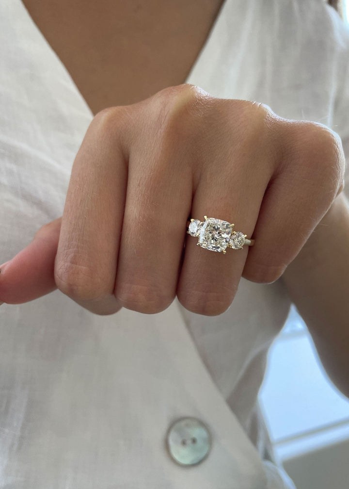 Angled view of cushion cut diamond in solitaire setting