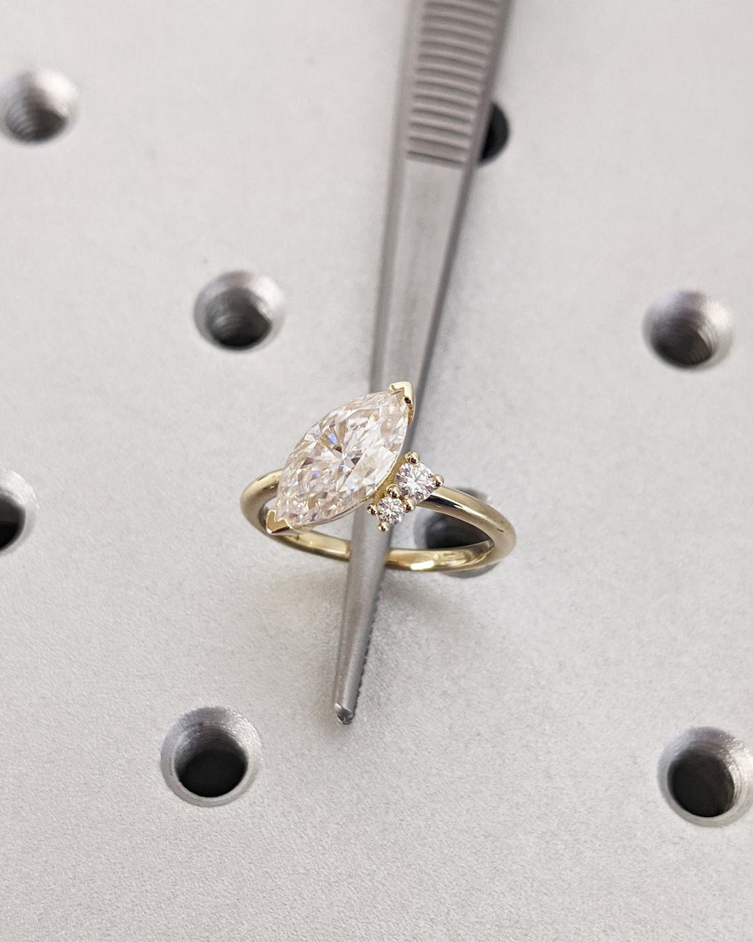 Marquise cluster engagement ring with certified lab grown diamond