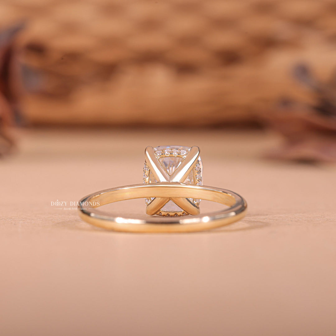 Cushion hidden halo engagement ring viewed from the side