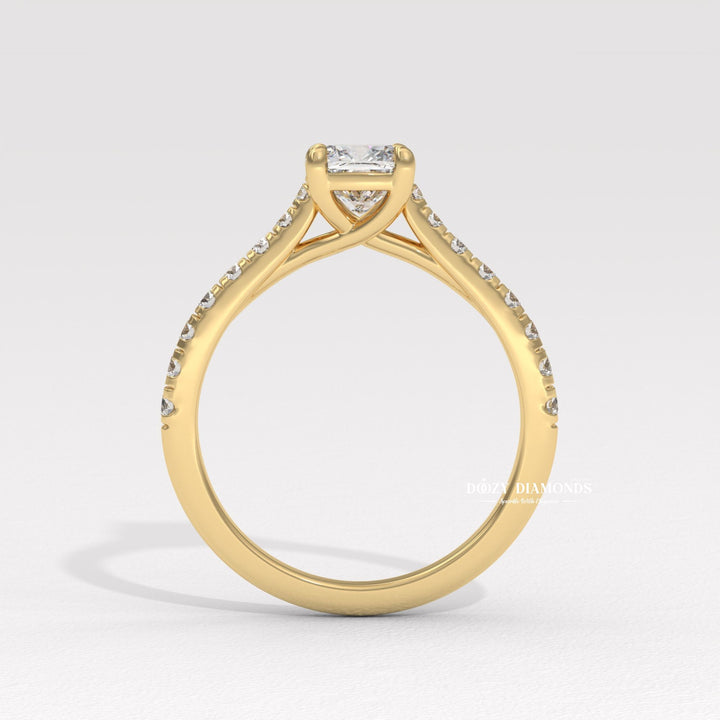 Macro shot of cushion cut diamond facets in solitaire ring setting