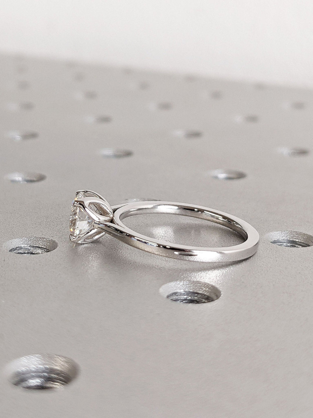 Round solitaire lab grown diamond ring side profile in gold setting