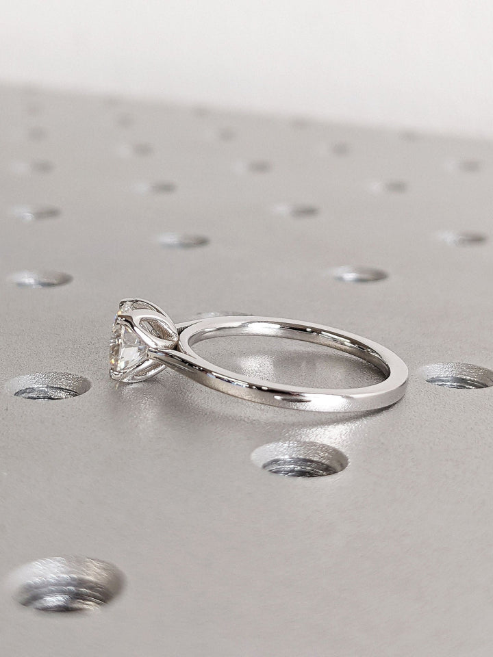 Round solitaire lab grown diamond ring side profile in gold setting
