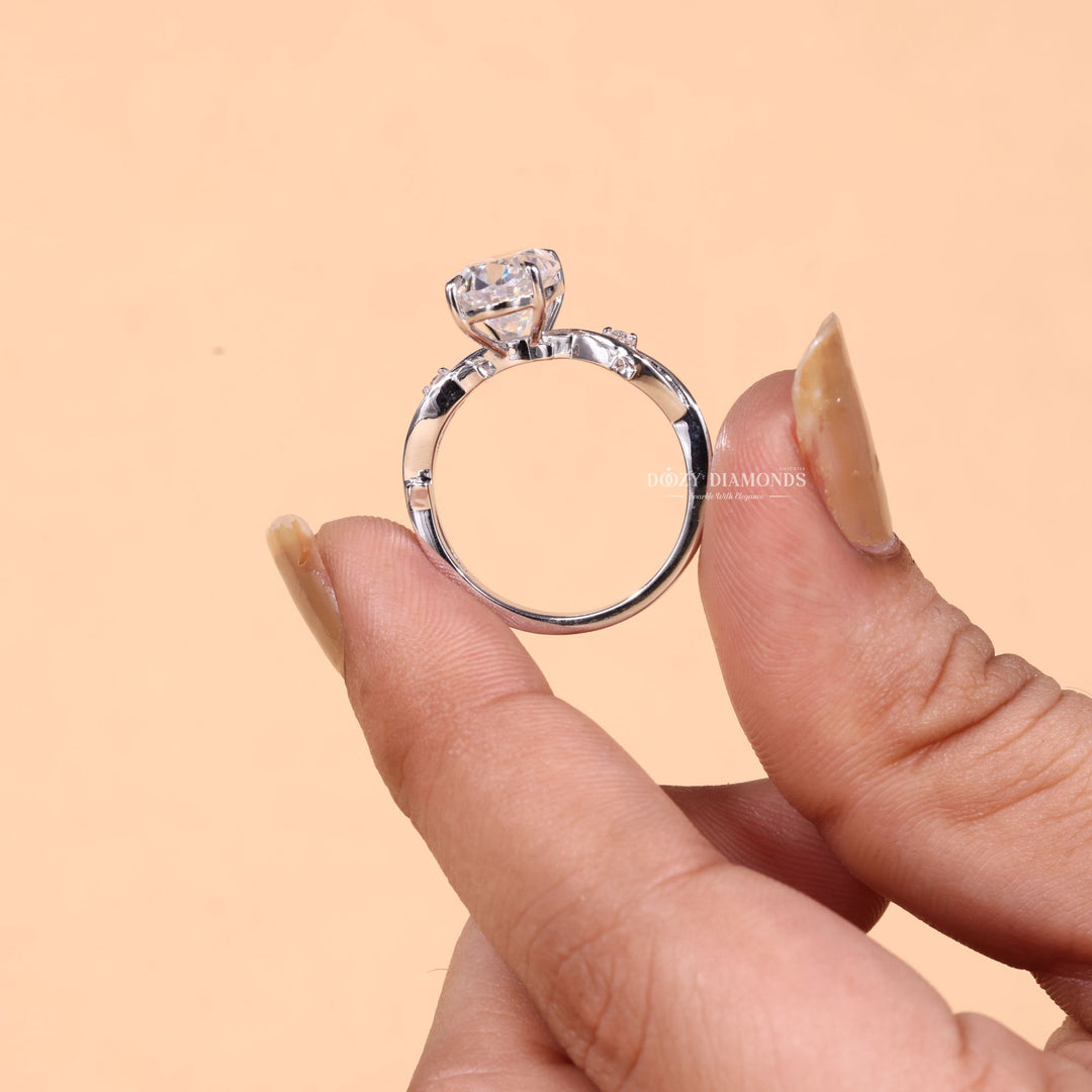 Macro shot of oval cut diamond facets in solitaire ring setting