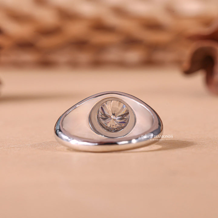 Round dome engagement ring photographed in natural light