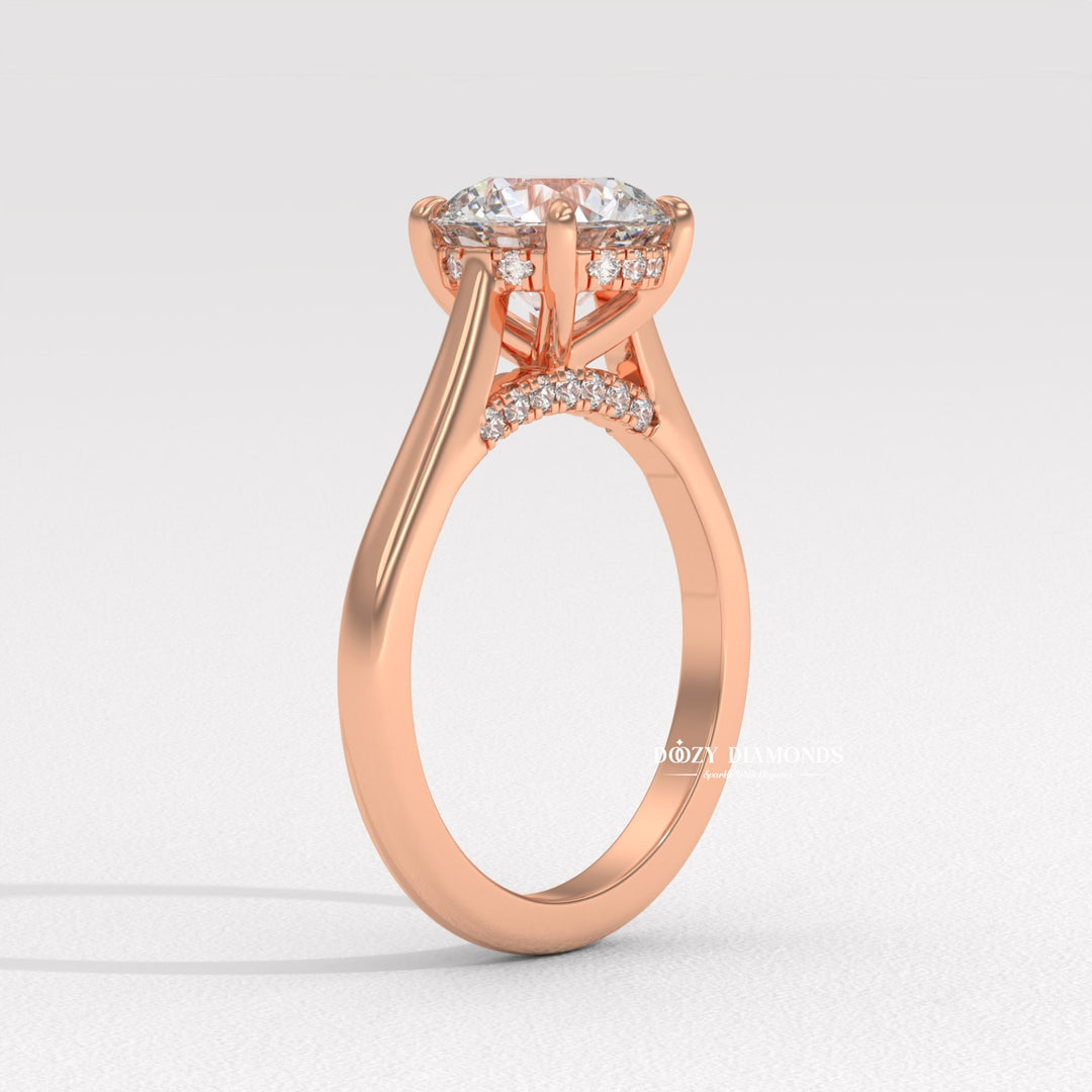 Round hidden halo engagement ring viewed from the side