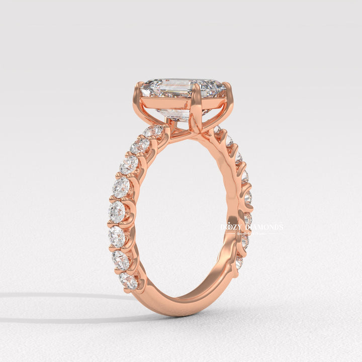 Emerald cut pave engagement ring shown in real-life wear