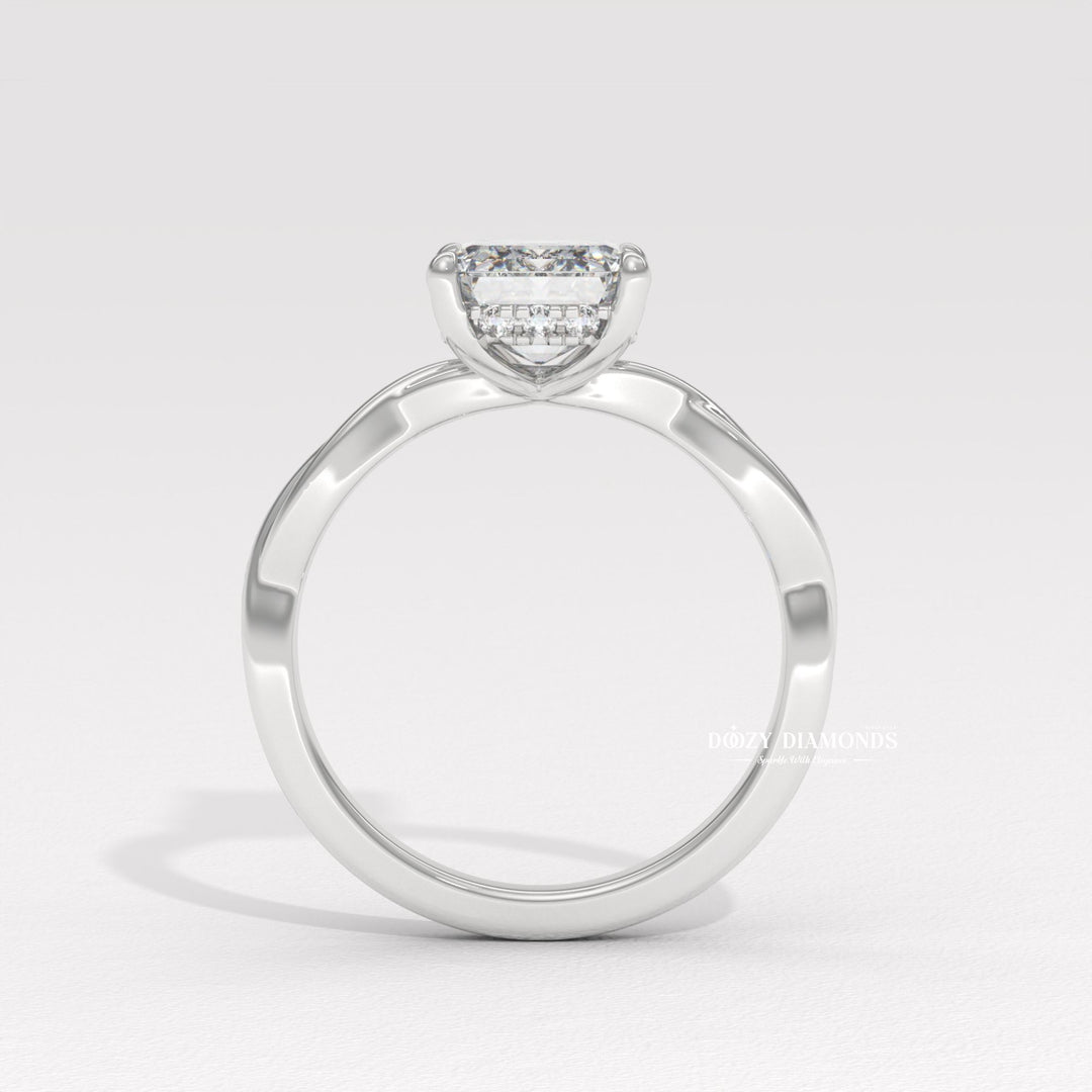 Emerald solitaire engagement ring photographed in natural light