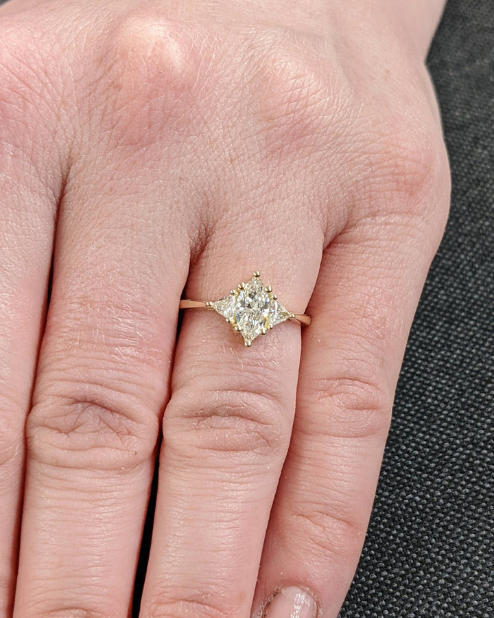 Macro shot of marquise cut diamond facets in solitaire ring setting