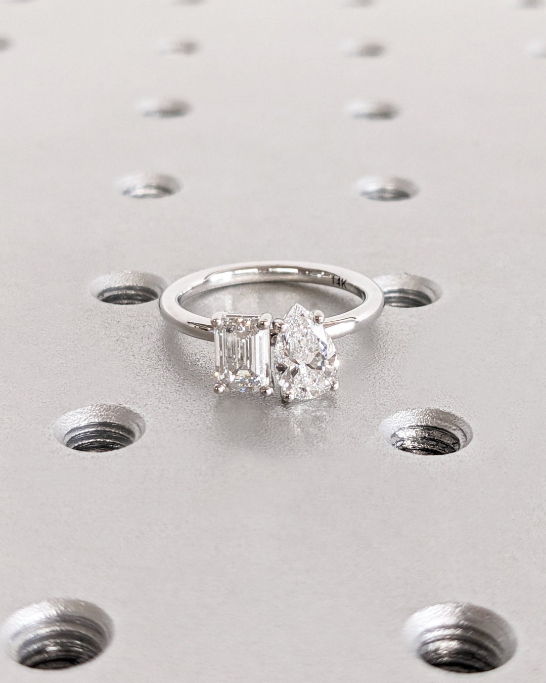 Pear solitaire engagement ring close-up showing high clarity diamond clarity