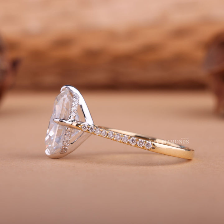 Cushion hidden halo engagement ring viewed from the side