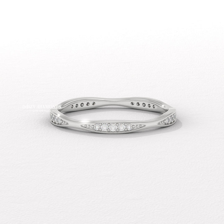 Tapered Pave diamond wedding band in yellow gold