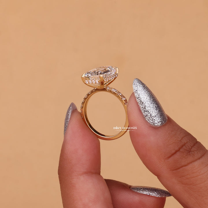 Emerald hidden halo lab grown diamond ring side profile in gold setting