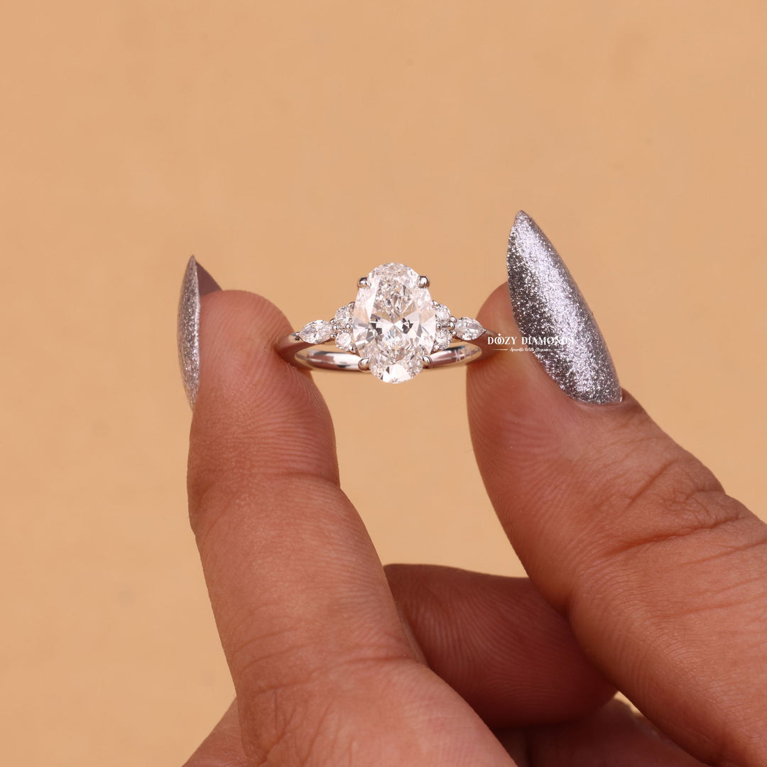 IGI certified oval cut diamond in cluster engagement ring setting