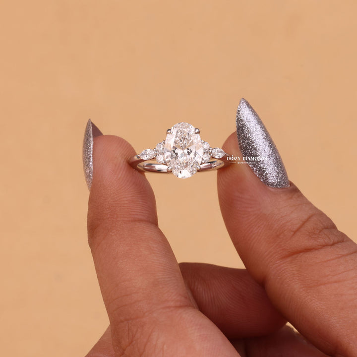 IGI certified oval cut diamond in cluster engagement ring setting