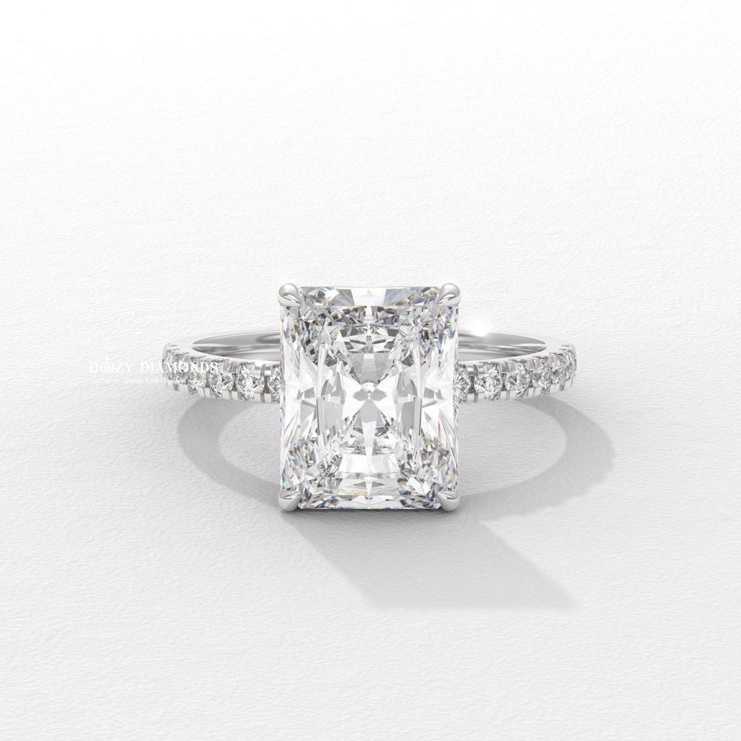 Radiant hidden halo engagement ring close-up highlighting diamond sparkle