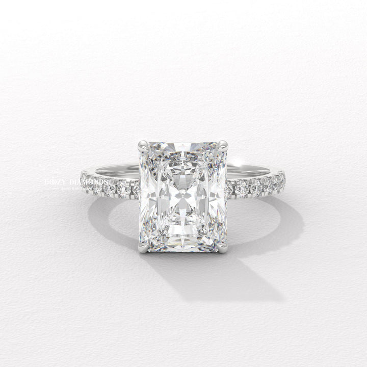 Radiant hidden halo engagement ring close-up highlighting diamond sparkle