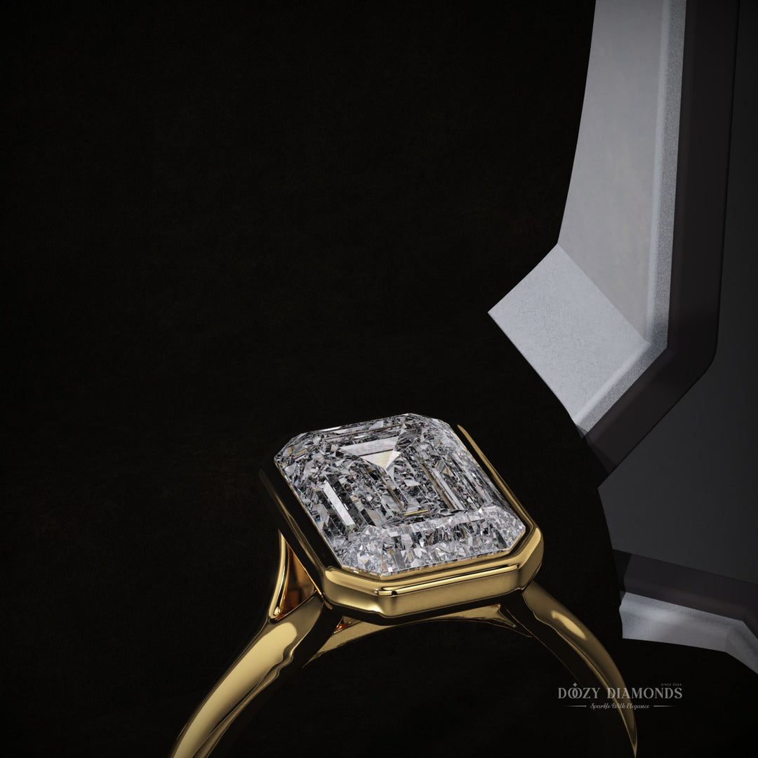 Emerald cut bezel engagement ring shown in real-life wear